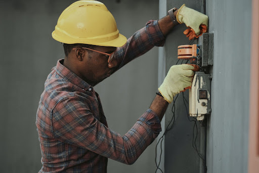 Man using Coax Cable Assemblies from NAI